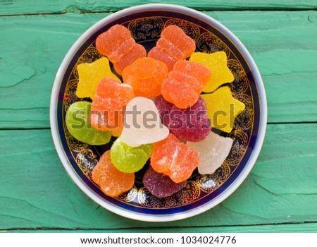 colorful figured marmalade on a saucer