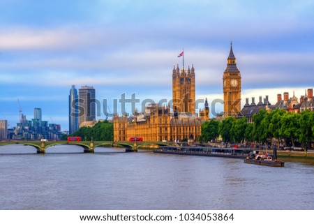 London, England, the Big Ben, the Houses of Parliament, Westminster bridge and Thames river on sunrise