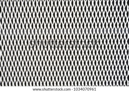 White grating, abstract texture Metallic net background. metal mesh. White coated grating