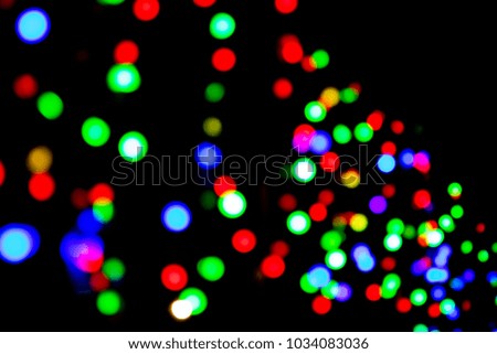 Bokeh Circle colour is Green, red, purple, pink on black background.