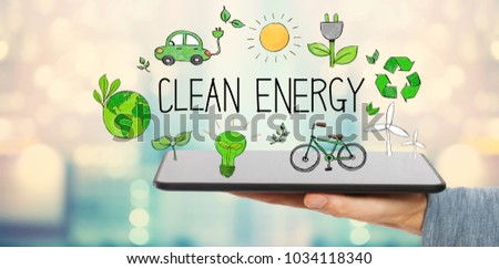 Clean Energy with man holding a tablet computer