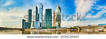 Moscow City skyline . Moscow International Business Centre at day time with Moskva river in foreground . High resolution Panorama Royalty-Free Stock Photo #1034120461