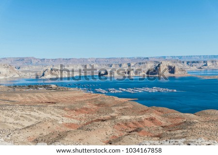 Scenic view of harbor with port in lake among rocks with a lot of boats somewhere in Utah, United States of America