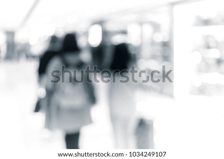 Abstract blur shopping mall interior and retail store for background in B&W color