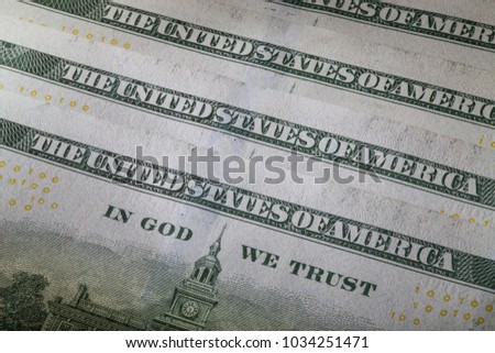 Fragments of several banknotes on black background