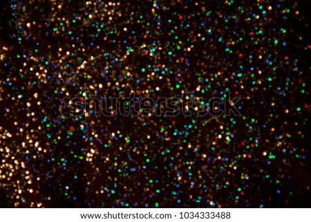 defocused abstract colorful glitter background.