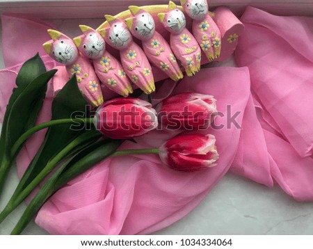 beautiful pink tulips and souvenirs for the holiday