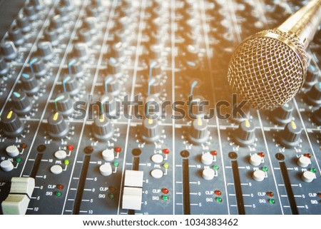 The microphone on the audio mixer.
