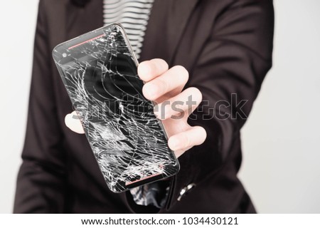 Black mobile phone Falling from the floor and Broken Touch screen