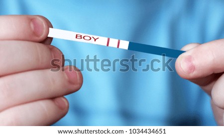 Pregnancy test in in children's hands, health