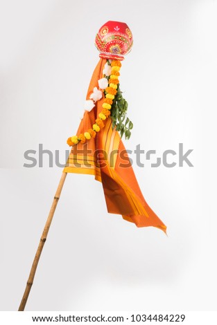 Happy Gudi Padwa greeting - it's a Hindu New Year celebrated across India where Gudhi is errected outside home made up of Bamboo stick, cloth, garland, neem and Mango leaves with Kalash