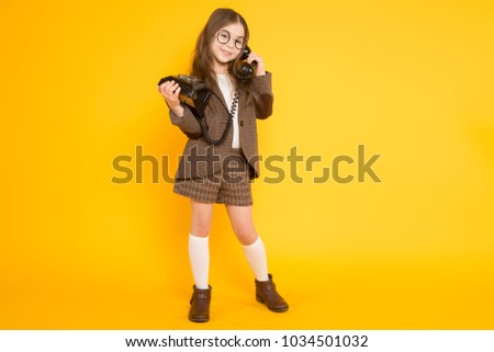 Little girl with telephone