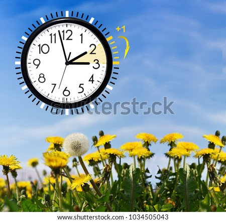 Daylight Saving Time. DST. Wall Clock going to winter time. Turn time forward. Abstract photo of changing time at spring. Royalty-Free Stock Photo #1034505043
