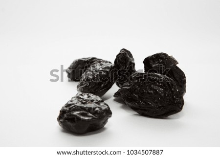 Prunes with white background. To Bishvat dry fruits