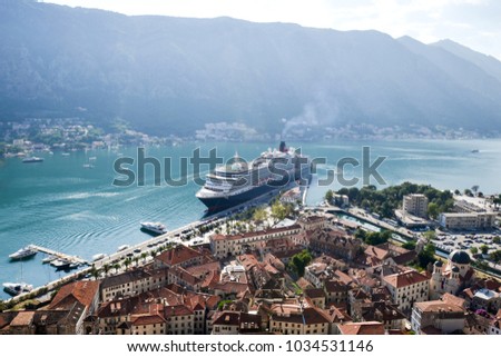 The panoramic view of the most beautiful coastal part of Montenegro, Boka Kotorska, the old Kotor city and the port popular among the giant cruise liners 
