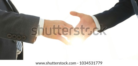 Two  business men going to make handshake
