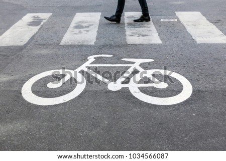Man passing on crosswalk