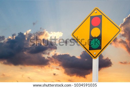 Warning sign of red light isolated on sky background