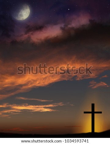 Cross on a hill . Cross on sunset sky background . Silhouette god's cross