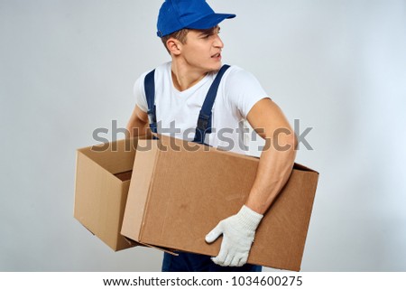   man with heavy boxes, moving                             