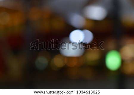 Blurred shiny bokeh night town street outdoors, beautiful glowing bright copyspace background