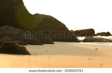 stone and sea sandy beach in thailand.