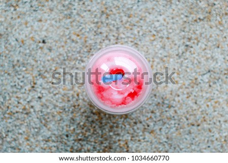Plastic cup is sweet red