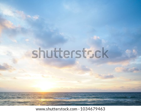 blue sky with clouds and sea, sunset Royalty-Free Stock Photo #1034679463