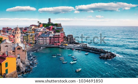 One of the five towns that make up the Cinque Terre region - Vernazza. Aerial spring view of Liguria, Italy, Europe. Picturesque seascape of Mediterranean sea. Traveling concept background.