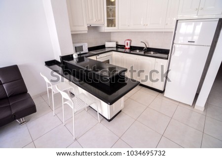Photo Picture internal view of a modern kitchen