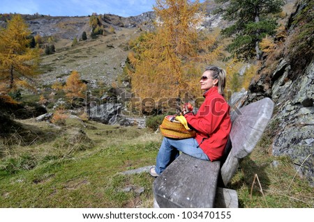  young woman tourist in alpine zone