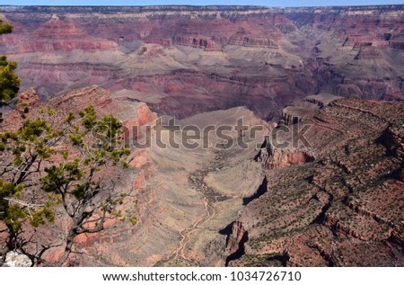 overlook over the bright angel trail,  plateau point and the immense south rim of the grand canyon, arizona, from the yavapai trail Royalty-Free Stock Photo #1034726710