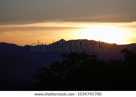 sunlight behind the mountain