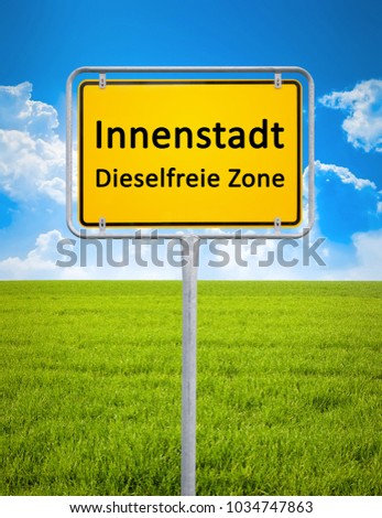 A german city sign with the text downtown - diesel free zone in german language