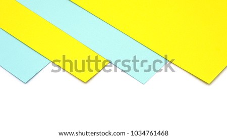 corner of a blue and yellow paper isolated on white background