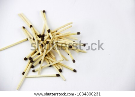 pile of matches on white background
