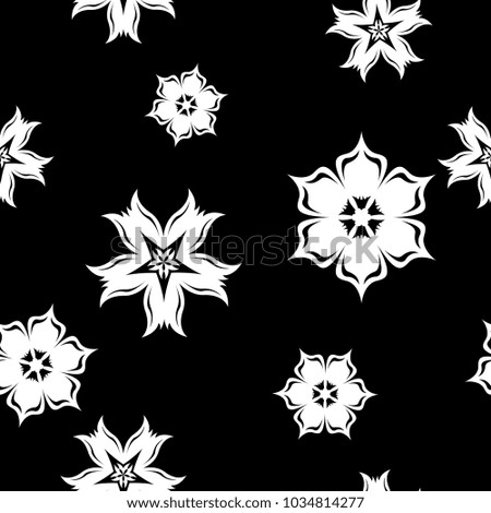 White floral ornament on black background. Seamless pattern for textile and wallpapers