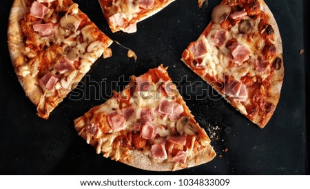 pizza slices on a black background 