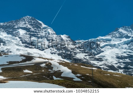 Spectacular view of the mountain Jungfrau and the four thousand meter peaks in the Bernese Alps from Greendeltwald valley, Switzerland Royalty-Free Stock Photo #1034852215
