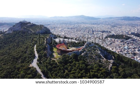 Aerial birds eye view photo taken by drone of Lycabettus hill, Athens historic center, Attica, Greece
