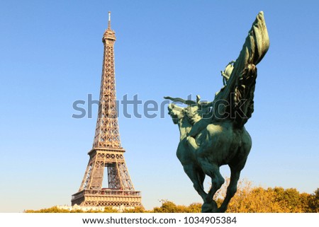 France, Paris, Eiffel Tower & napoleon statue in one frame.