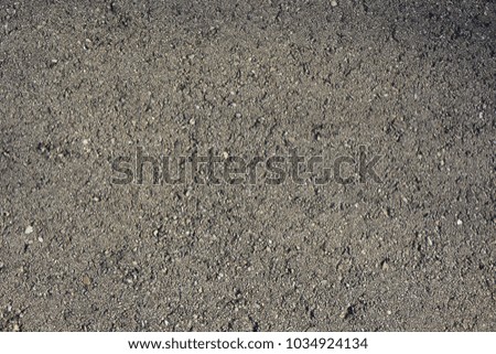 Tileable background map or back drop of  patterned asphalt for use as backdrop or back ground.