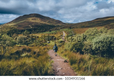 On the way of the west highland way in concic hill in scotland Royalty-Free Stock Photo #1034931166