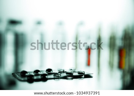 Empty blister pack of Group of ampoules with a transparent medicine in medical laboratory background