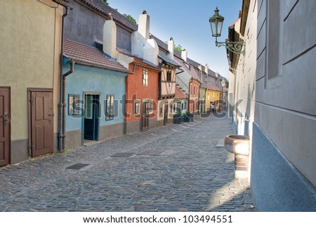 Picture a bright-colored houses on the famous street "Zlata ulicka", Prague.
