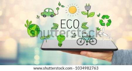 Eco with man holding a tablet computer