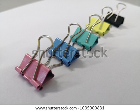 Colourful Paper clip on white background