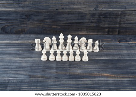 chess isolated on a wooden background