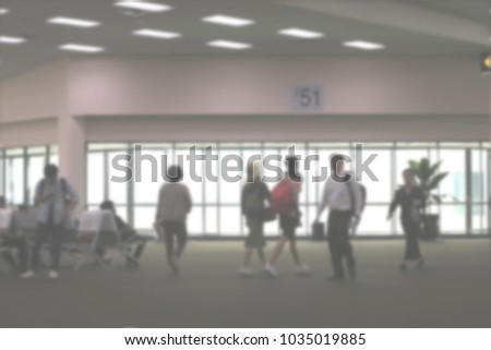 Blurred vision of people walking at the airport to travel