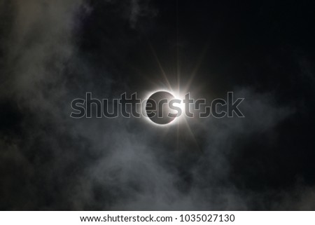 Sun Solar Eclipse with the moon in 2017 North America Wedding Ring with clouds